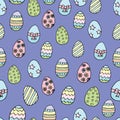 Seamless easter eggs pattern on blue background